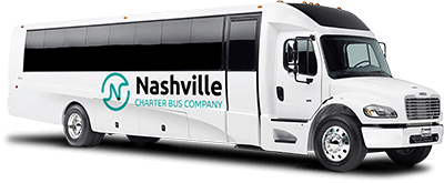 a white minibus with a "nashville charter bus company" logo on it
